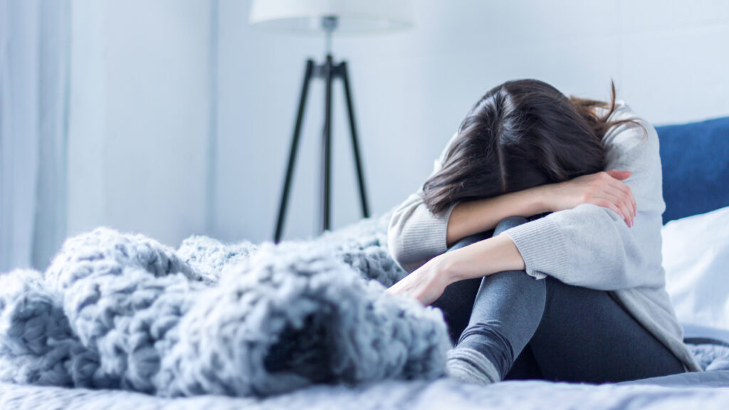 Woman upset and uncomfortable at her home possibly in danger from quitting heroin without medical supervison