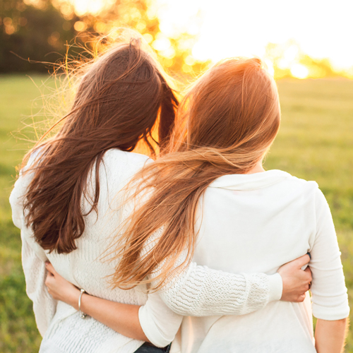 Two women hugging