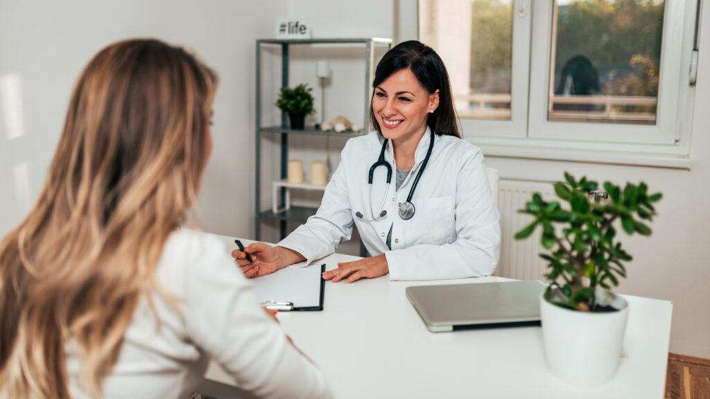 Detox patient meeting with doctor.