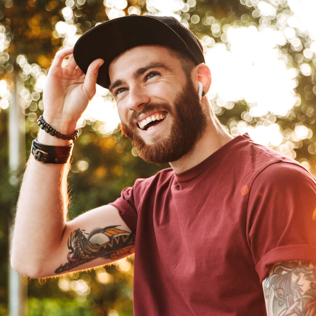 Happy man smiling outdoors